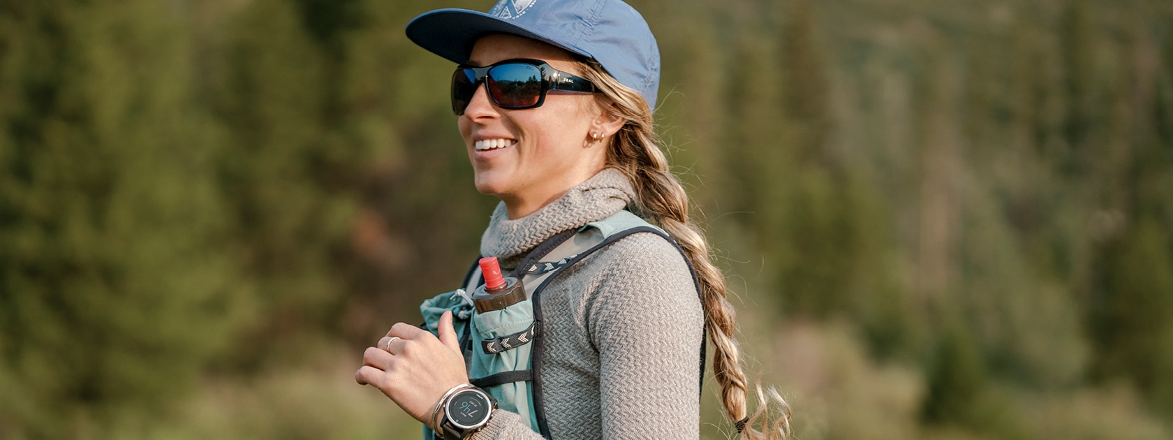 woman wearing zeal nucla lightweight polarized sunglasses trail running