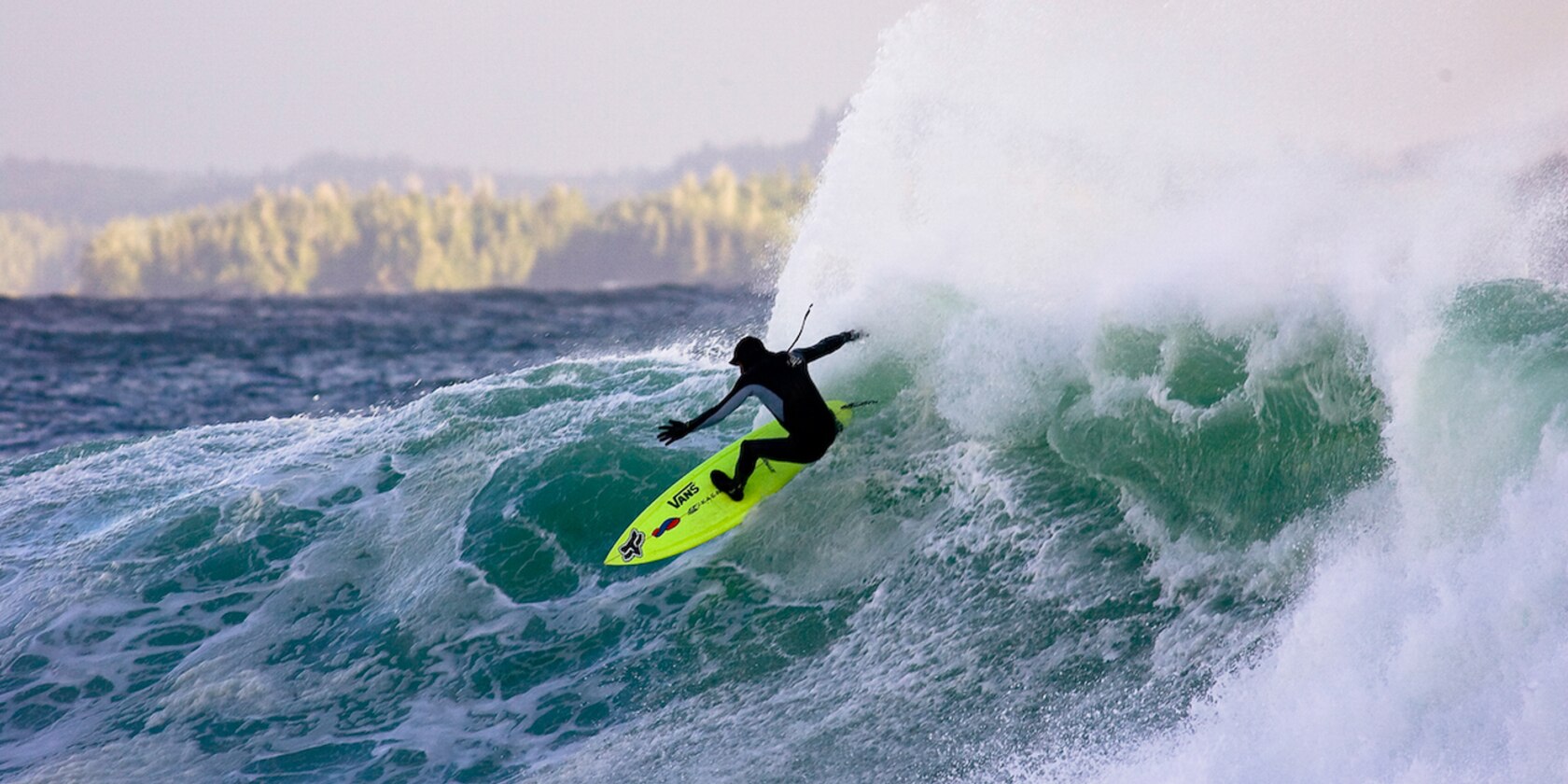 surfer riding large wave