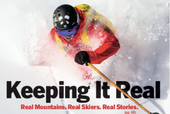 magazine cover showing a man in a red coat skiing