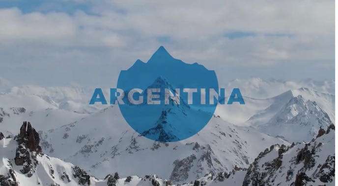 photo of snowy mountain with blue Argentina logo on top