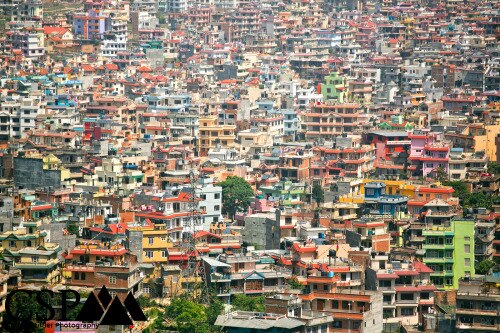 Overhead view of Nepal with hundreds of colorful buildings