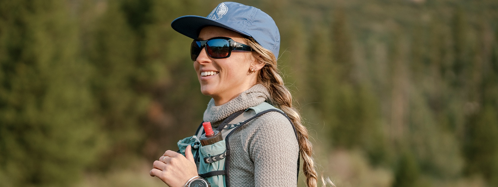 close up image of a woman running wearing zeal polarized sunglasses